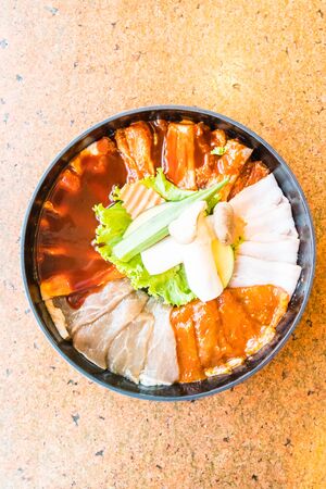 Raw fresh meat in plate prepare to grilled - Warm white balance processingの写真素材
