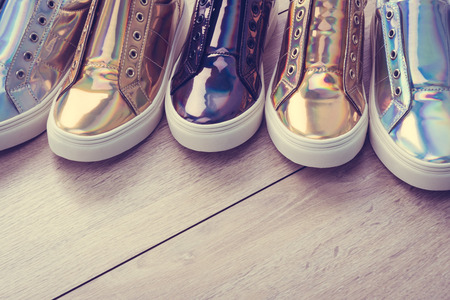 Fashion shoes and sneaker on wooden background - Vintage Filterの写真素材