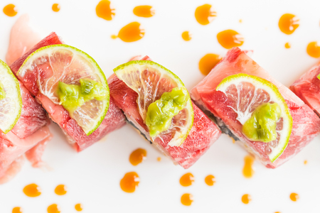 Selective focus point on Beef sushi in white plate - Japanese food styleの写真素材