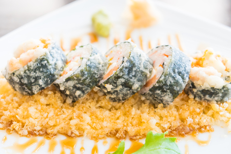 Selective focus point on Tempura sushi maki in white plate - Japanese food styleの写真素材