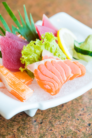 Raw and fresh sashimi dish with salmon , tuna and crab stick - Japanese food styleの写真素材
