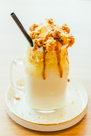 Iced caramel milk shake glass - Color filter Processingの写真素材