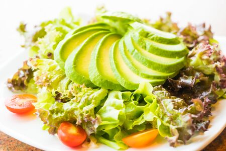 Fresh Avocado salad with vegetable - Healthy food style