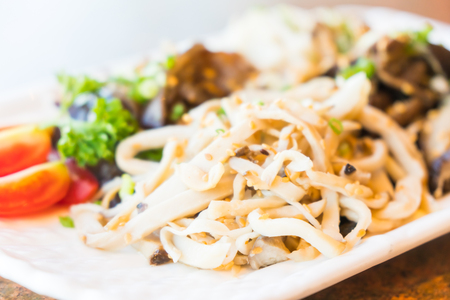 Mushroom salad in white plate - Healthy food styleの写真素材