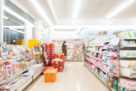 Abstract blur and defocused supermarket and convenience store interior for backgroundの写真素材