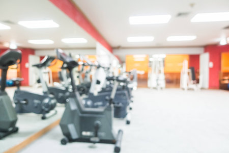 Abstract blur gym and fitness room interior for background