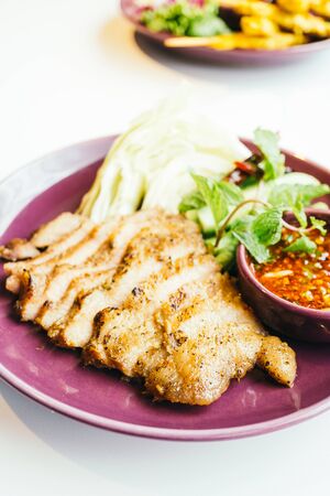 Grilled pork neck meat with spicy sauce - Thai food style , Color filter Processingの写真素材