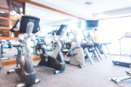 Abstract blur gym and fitness room with sport equipment interior for background - Blue white balance Processingの写真素材