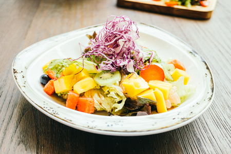 Mixed Fruit salad with vegetable in plate - Healthy food styleの写真素材