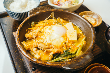 Kimchi nabe in hot plate with rice - Japanese food styleの写真素材