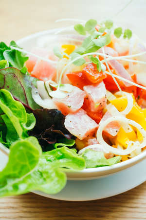 Raw and fresh tuna with vegetable salad in white bowl - Healthy food style , Color Filter Processing