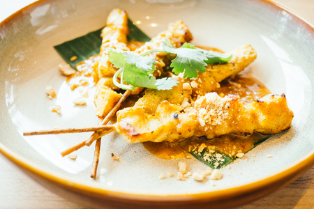 Grilled chicken meat satay with sweet sauce - Thai food style , Color Filter Processingの写真素材