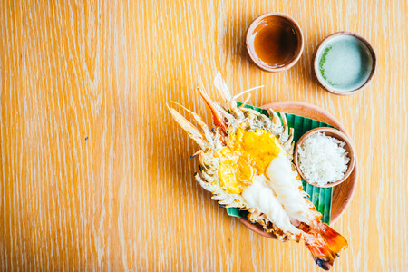 Grilled shrimp or prawn steak with spicy and fish sauceの写真素材