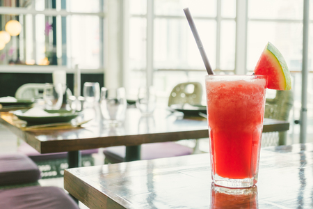 iced watermelon juice smoothies glass on table - Color filter Processingの写真素材