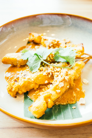 Grilled chicken meat satay with sweet sauce - Thai food style , Color Filter Processingの写真素材