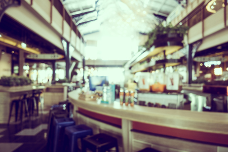 Abstract blur and defocused restaurant and coffee shop cafe interior for background - Vintage Filterの写真素材