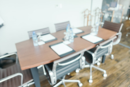 Abstract blur and defocused meeting room office interior for backgroundの写真素材