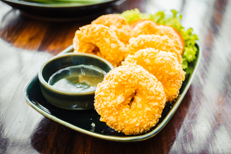 Fried prawn or shrimp cake and ball with sweet sauce - Color filer Processingの写真素材