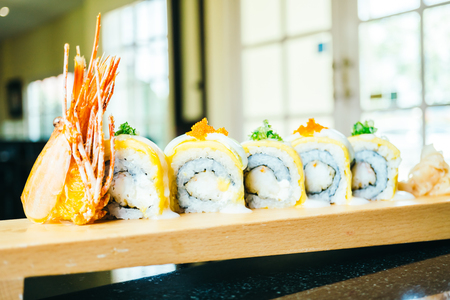 Shrimp or prawn sushi on wooden plate - Japanese food styleの写真素材