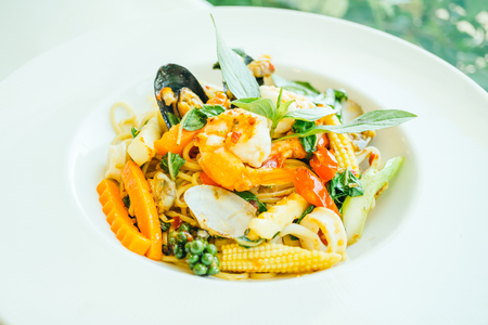 Spicy seafood spaghetti or pasta in white plate - Italian food styleの写真素材