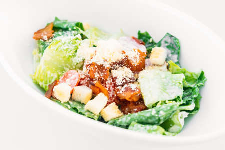Caesar salad in white bowl - Healthy food styleの写真素材