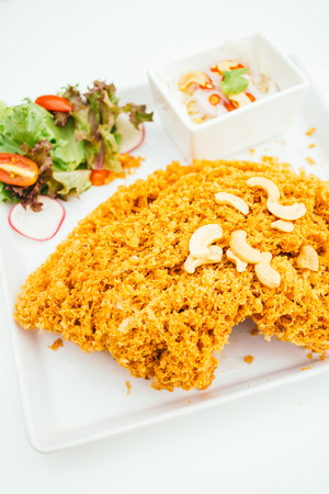Crispy catfish salad with spicy sauce - Thai food styleの写真素材