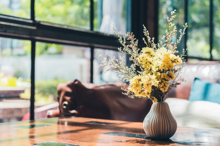 Vase flower on table decoration interior of roomの写真素材