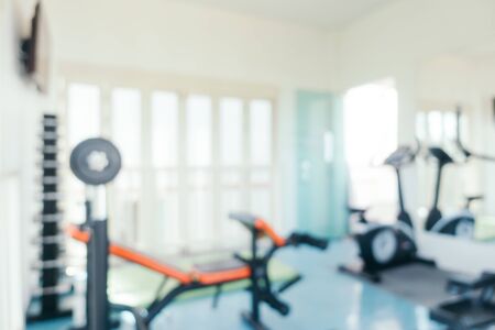 Abstract blur sport equipment in gym interior for backgroundの写真素材