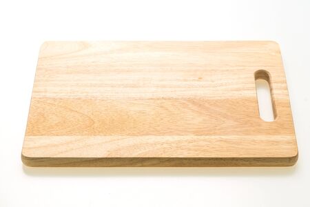 Brown wooden chopping and cutting board isolated on white backgroundの写真素材