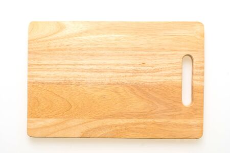 Brown wooden chopping and cutting board isolated on white backgroundの写真素材