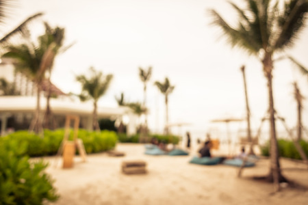 Abstract blur and defocused palm tree with beach and sea for background - Vintage Filterの写真素材