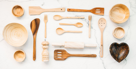 Kitchen utensils with copy space on white marble stone backgroundの写真素材