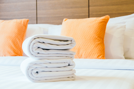 White bath towel on bed decoration bedroom interiorの写真素材