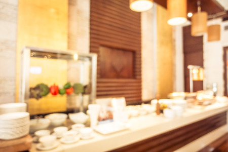 Abstract blur and defocused breakfast buffet at hotel restaurant interior for background - Vintage Filterの写真素材