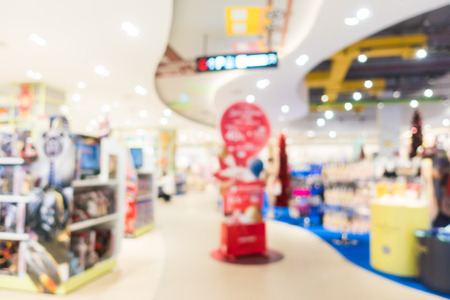 Abstract blur and defocused shopping mall in department store interior for backgroundの写真素材