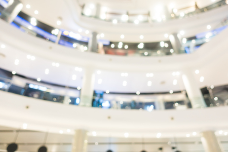 Abstract blur and defocused shopping mall in department store interior for backgroundの写真素材