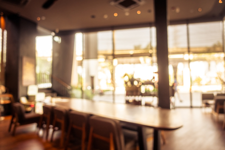 Abstract blur and defocused coffee shop cafe and restaurant interior for background - Vintage Filterの写真素材