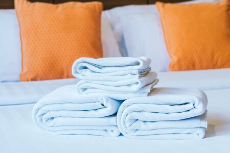 White bath towel on bed decoration bedroom interiorの写真素材