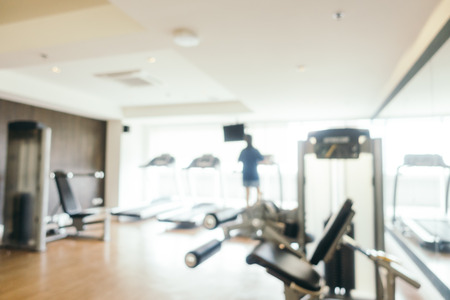 Abstract blur fitness equipment and gym interior for backgroundの写真素材