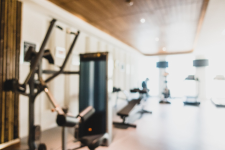 Abstract blur and defocused fitness equipment in gym interior for backgroundの写真素材