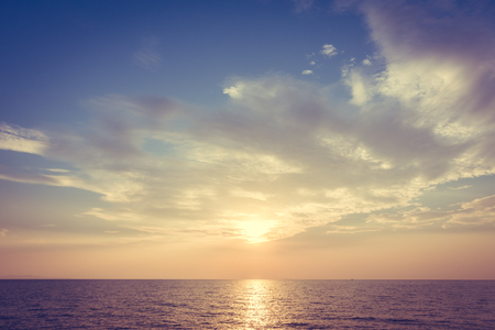 Beautiful sunset on the beach and sea - Vintage Filterの写真素材