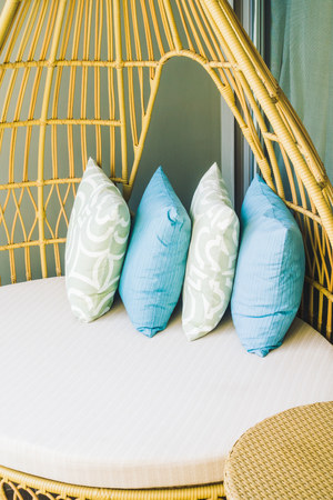 Pillow on sofa with outdoor viewの写真素材