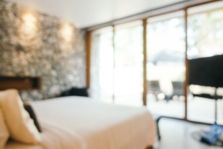 Abstract blur defocused hotel bedroom interior for backgroundの写真素材