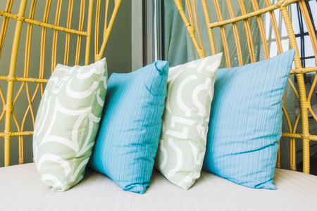 Pillow on sofa with outdoor viewの写真素材