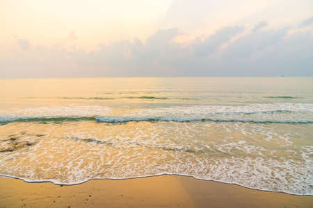 Beautiful beach and sea on sunrise time - Vacation conceptの写真素材