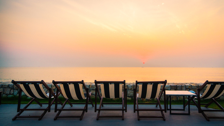 Beach bed and chair with beach and sea - Vacation conceptの写真素材