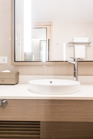Faucet and sink decoration in bathroom interiorの写真素材