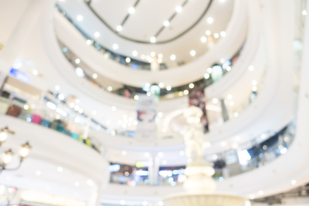 Abstract blur and defocused shopping mall in department store interior for backgroundの写真素材
