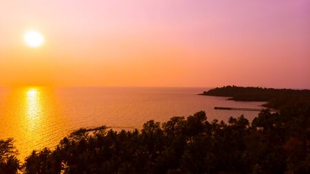 Aerial view with sea and beach on the island at sunset time for travel - Holiday Vacation conceptの写真素材