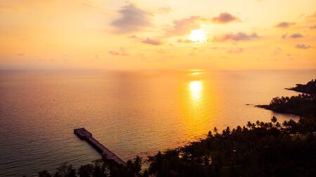 Aerial view with sea and beach on the island at sunset time for travel - Holiday Vacation conceptの写真素材